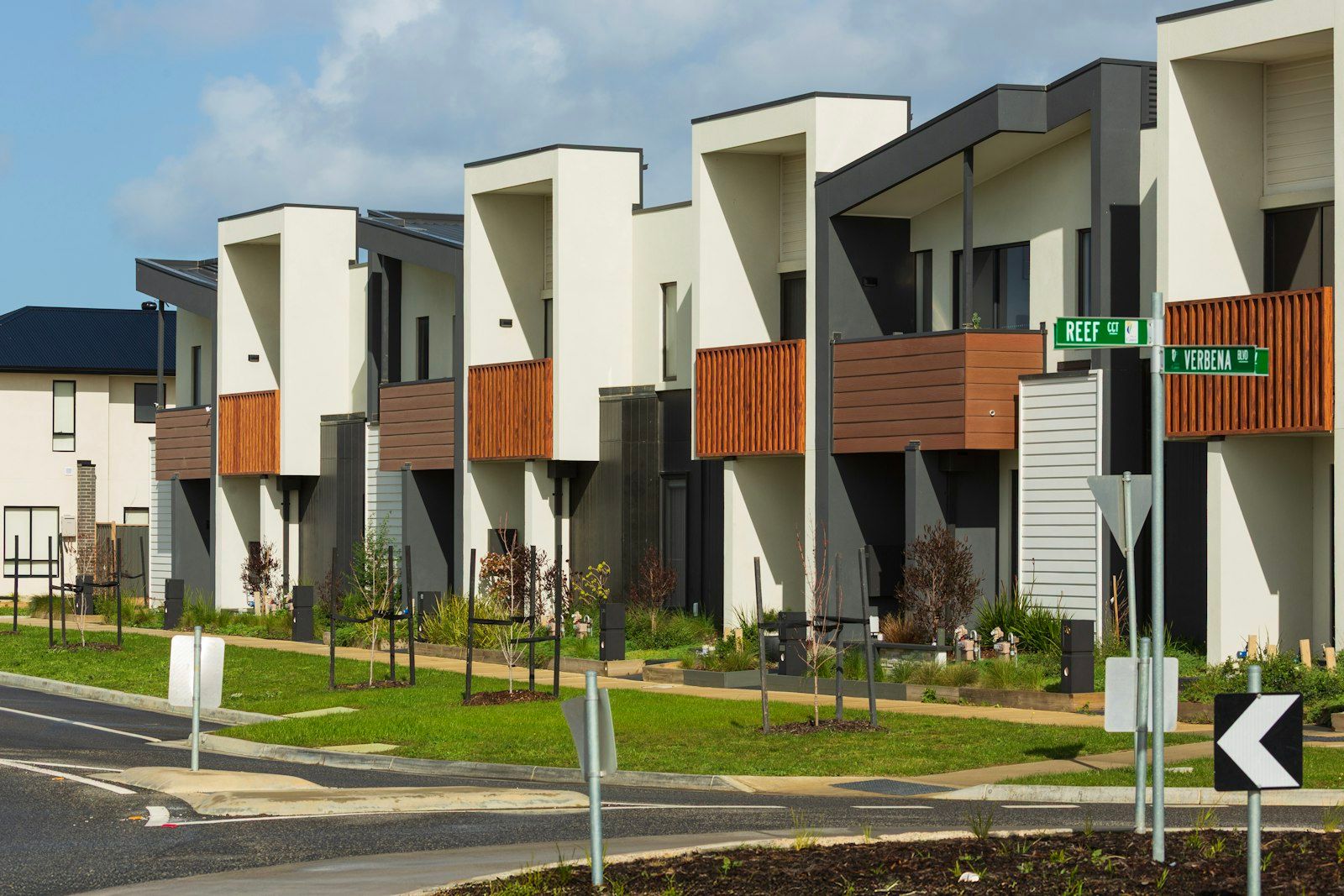 New townhouses along a street in a housing estate
